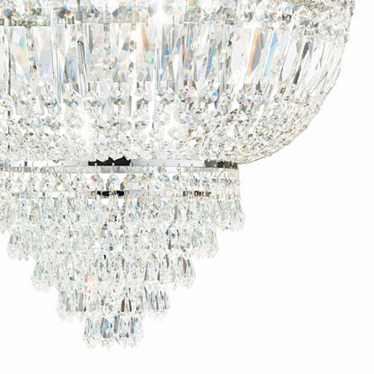 zoom of chrome and clear cut crystal chandelier on white background