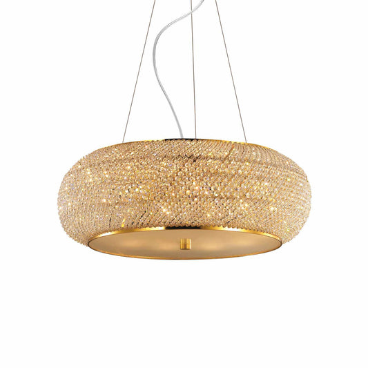 Drum shaped, round golden suspension lamp with clear crystals on white background