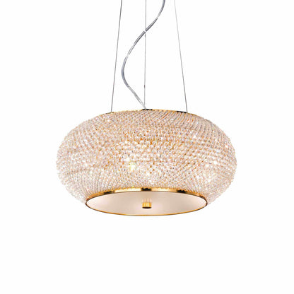Drum shaped, round golden suspension lamp with clear crystals on white background